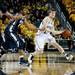 Michigan senior Matt Vogrich drives against a Penn State defender on Sunday, Feb. 17. Daniel Brenner I AnnArbor.com